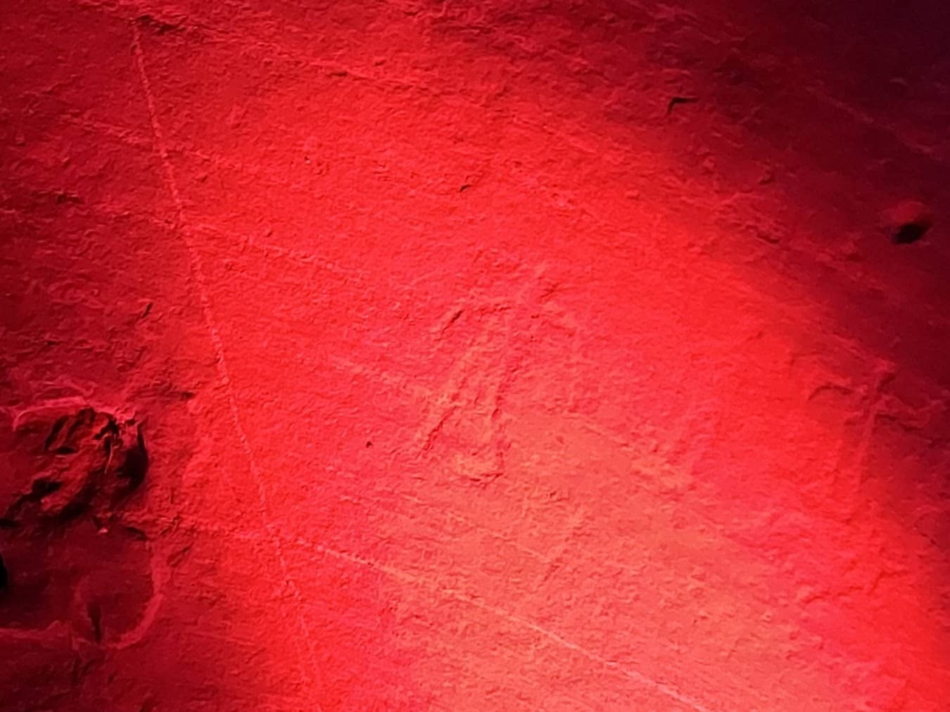 Hagood Mill petroglyph under red lighting